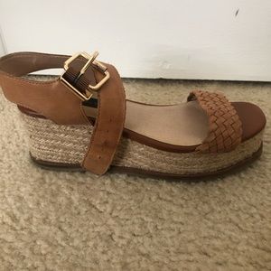 Open toe brown shoes